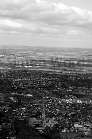 Salisbury looking with the Cathedral in the foreground. Old Sarum and High Post in distance. (B&W)